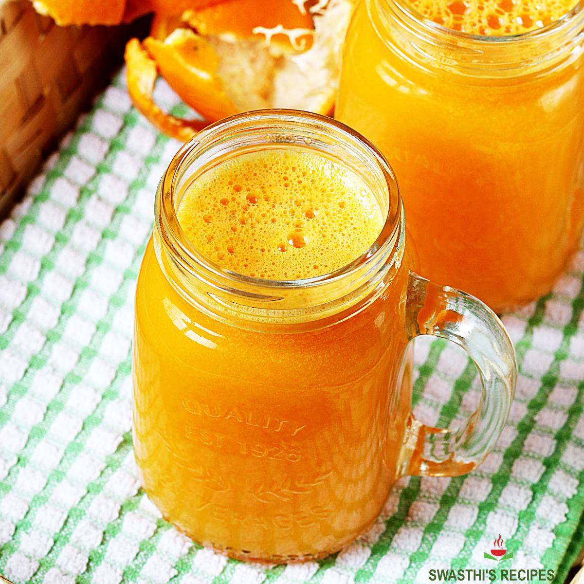 orange juice in mason jar.