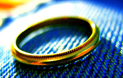 Gold Ring on blue background